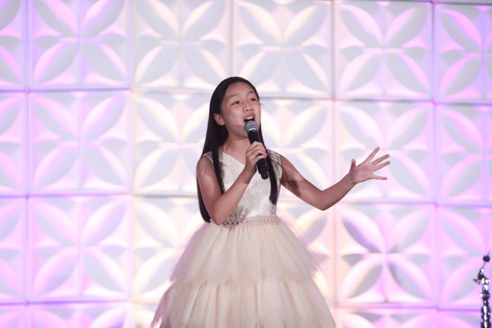 Malea Emma Tjandrawidjaja singing the National Anthem